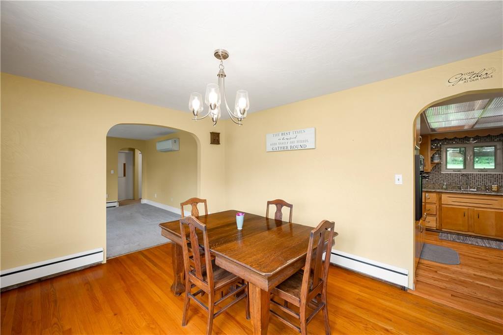 120 West Sunbury Road Butler, PA 16001 - Photo 7 of 46 a view of a dining room with furniture and wooden floor