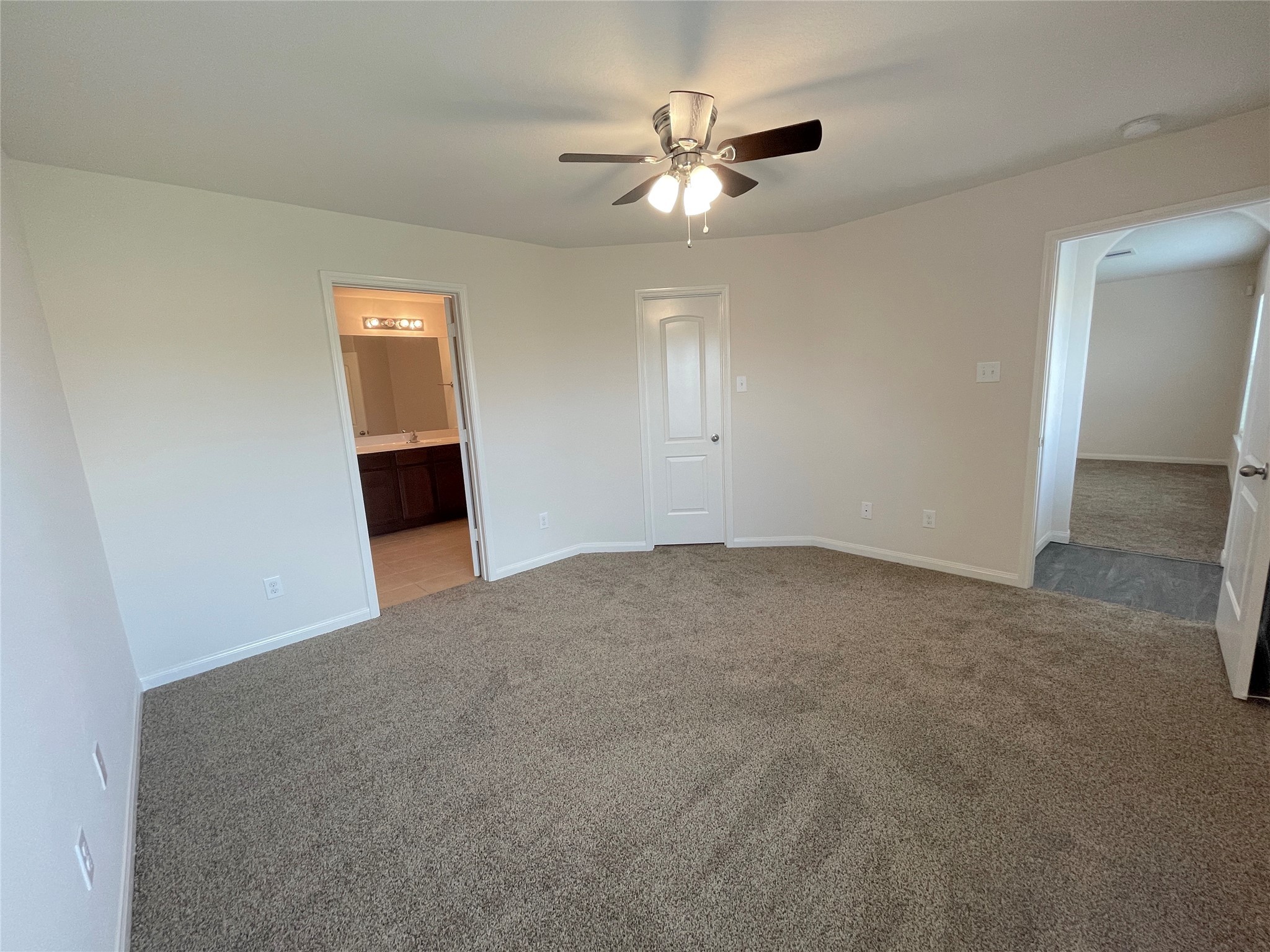 20714 Round Key Drive Hockley, TX 77447 - Photo 13 of 20 a view of a livingroom with a chandelier fan