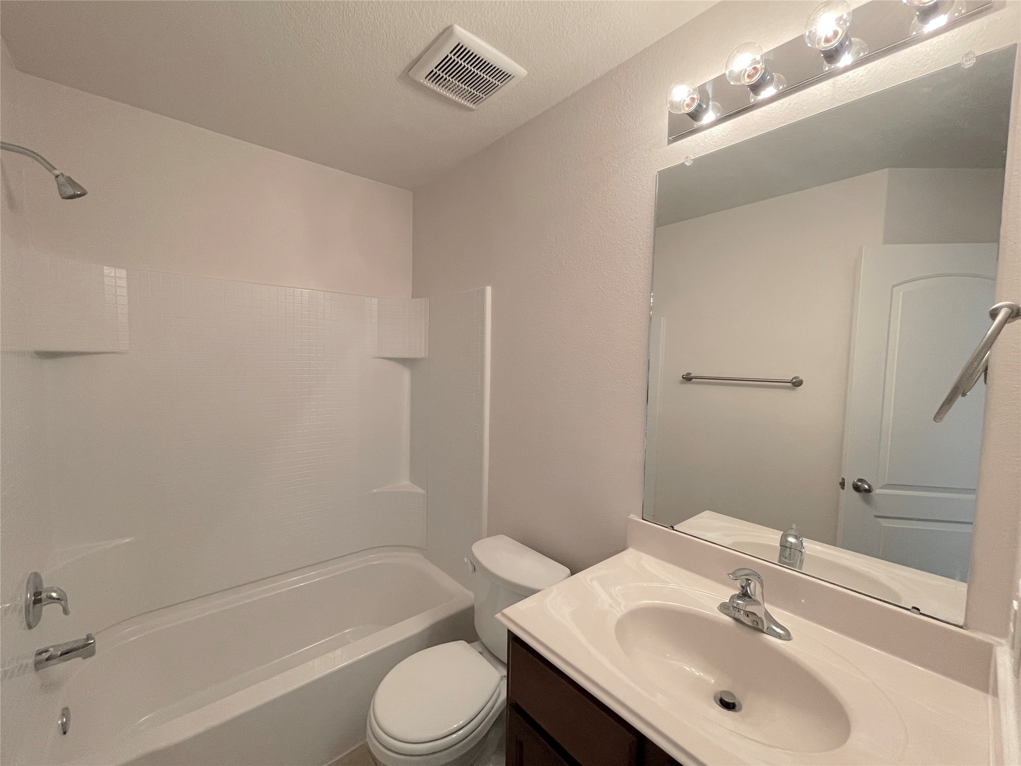 20714 Round Key Drive Hockley, TX 77447 - Photo 6 of 20 a bathroom with a sink toilet and shower