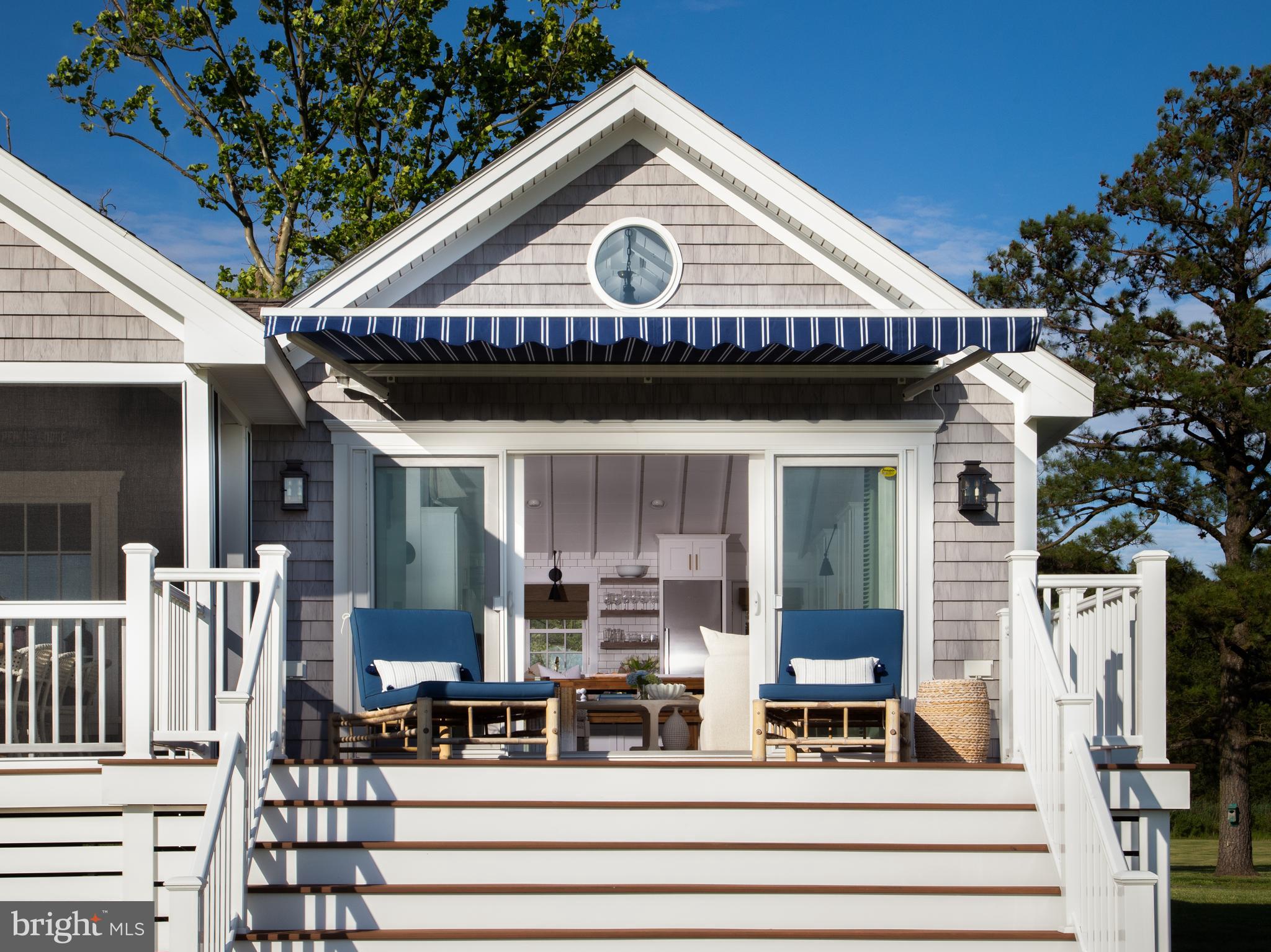 5144 David Greene Road Cambridge, MD 21613 - Photo 2 of 63 Waterside Deck with Retractable Awning
