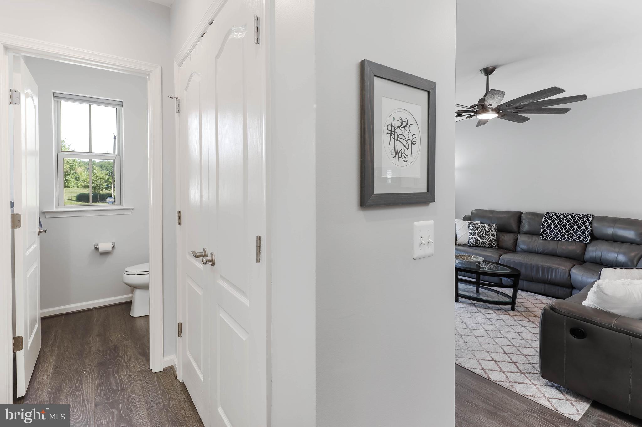 3048 Bretons Ridge Way Hanover, MD 21076 - Photo 12 of 34 Convenient main level half bathroom tucked away!