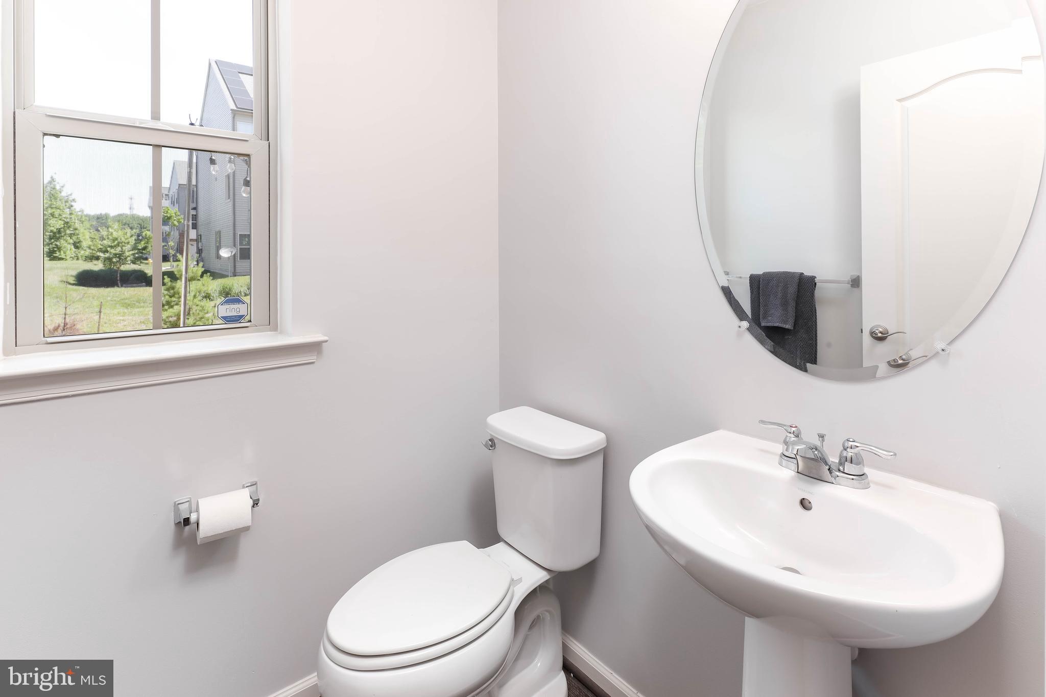 3048 Bretons Ridge Way Hanover, MD 21076 - Photo 13 of 34 Main level half bathroom