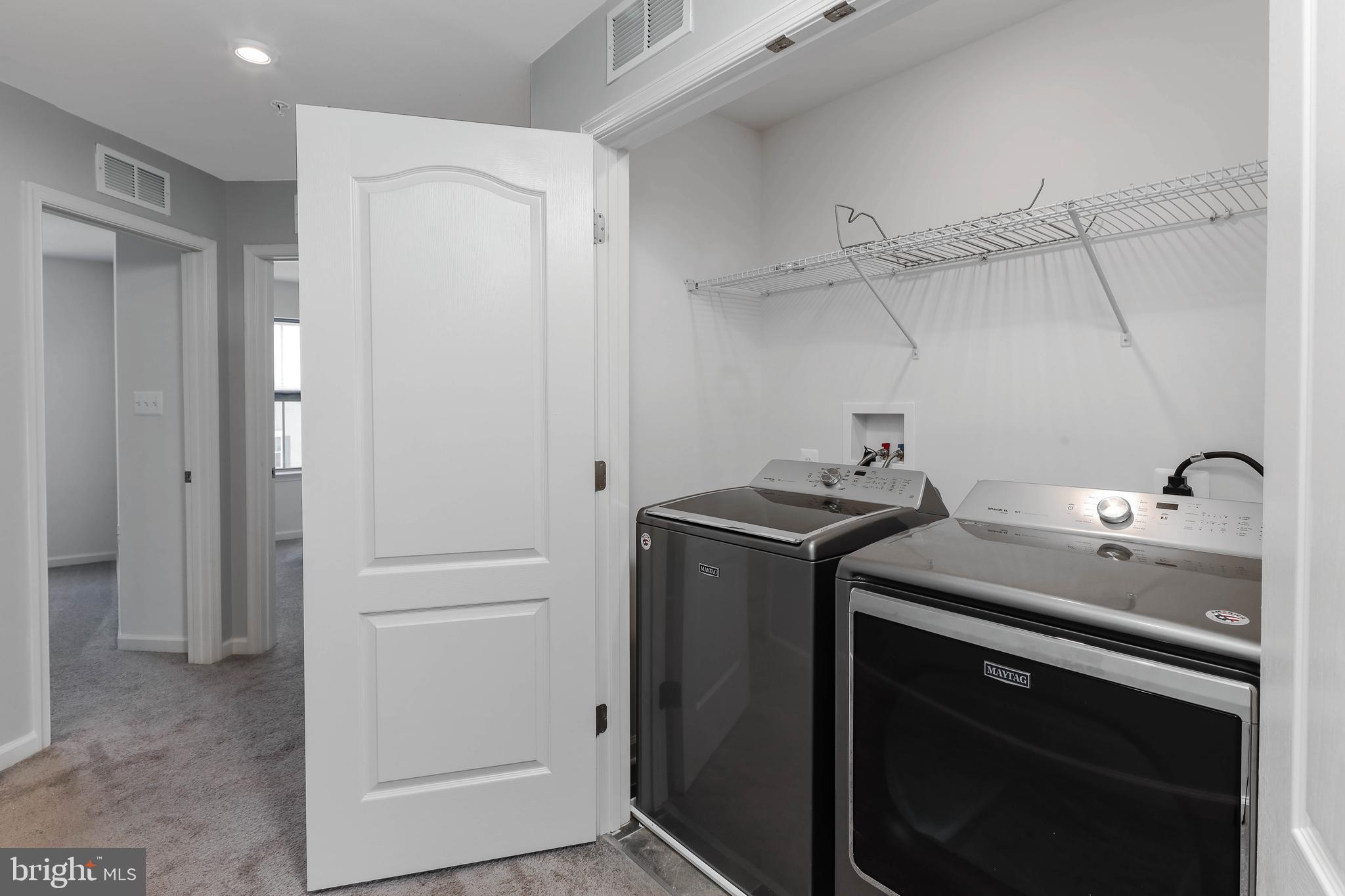 3048 Bretons Ridge Way Hanover, MD 21076 - Photo 17 of 34 Upstairs bedroom-level washer and dryer