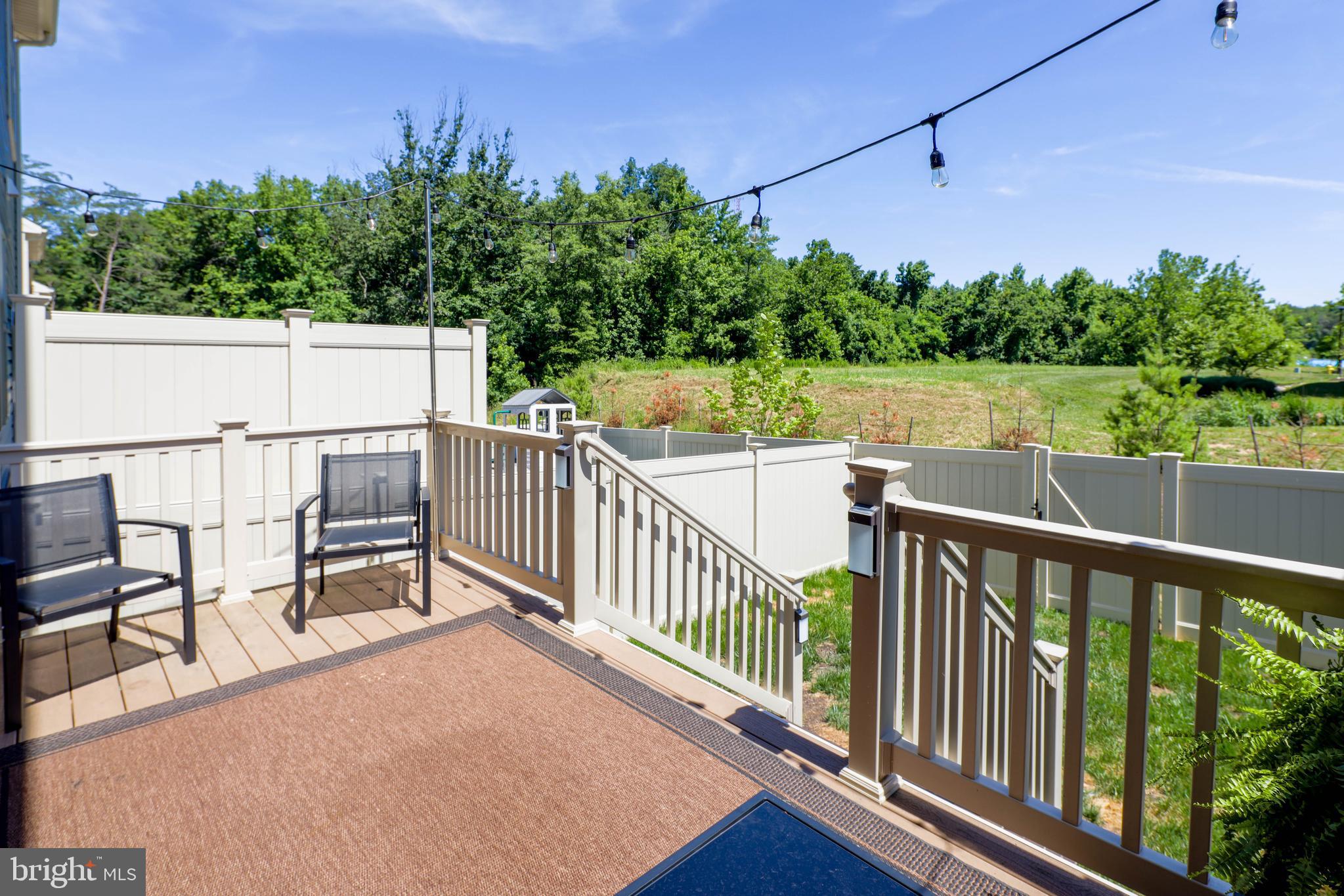 3048 Bretons Ridge Way Hanover, MD 21076 - Photo 10 of 34 Deck off of family room and beautiful wooded lot!