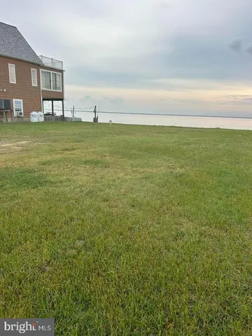 a view of a ocean with a big yard