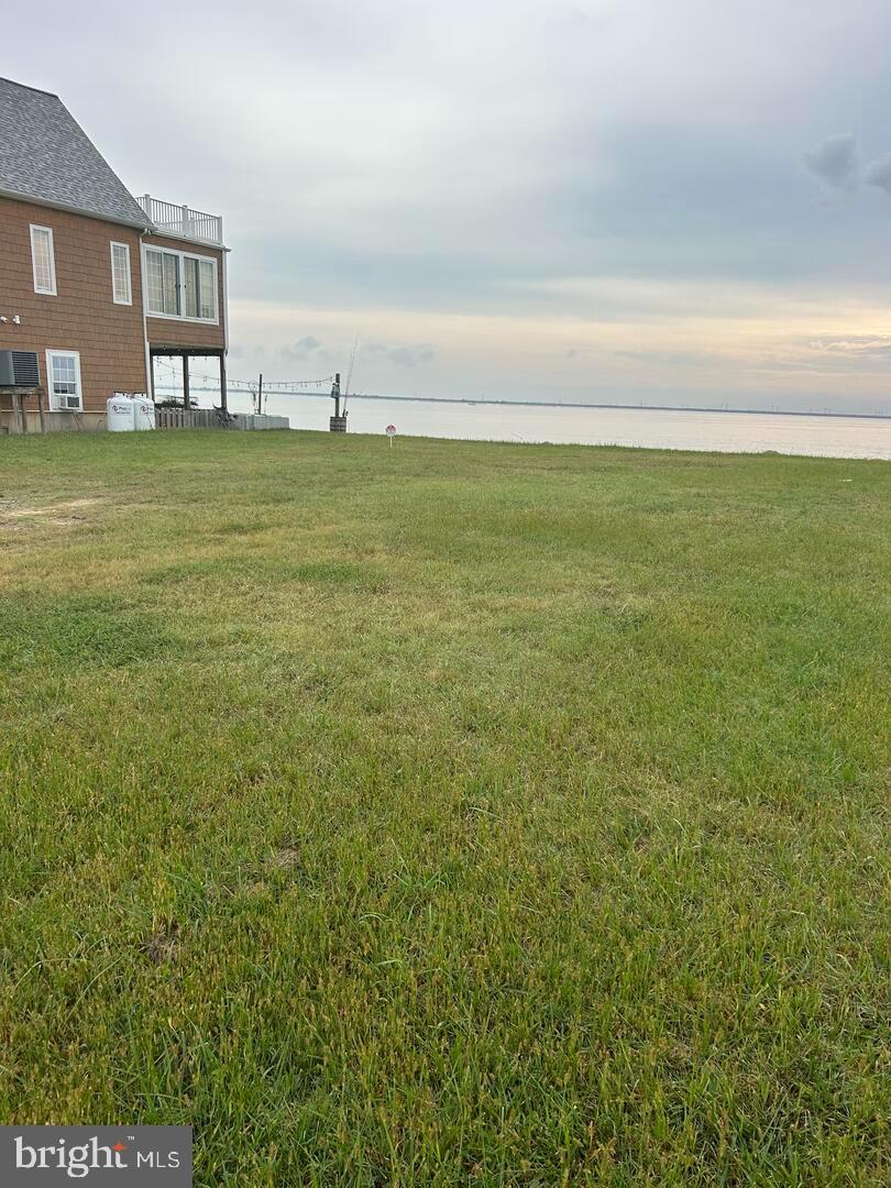 44 North New Road Middletown, DE 19709 - Photo 2 of 4 a view of a ocean with a big yard