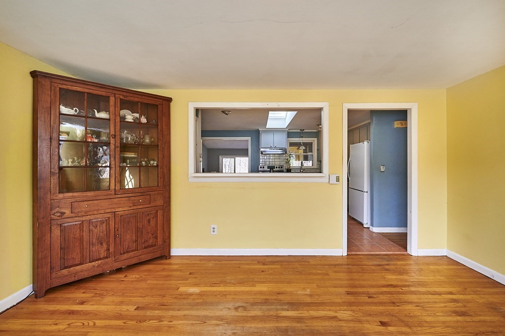 317 Florence Road Northampton, MA 01062 - Photo 5 of 38 a view of a room with wooden floor and cabinet