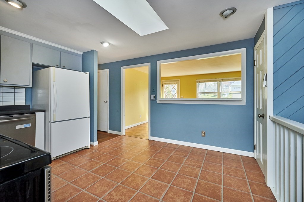 317 Florence Road Northampton, MA 01062 - Photo 9 of 38 a view of a kitchen with a refrigerator a stove top oven