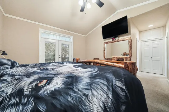 a view of house with a chairs and table in a patio