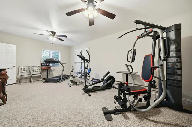 a view of a livingroom with furniture and windows
