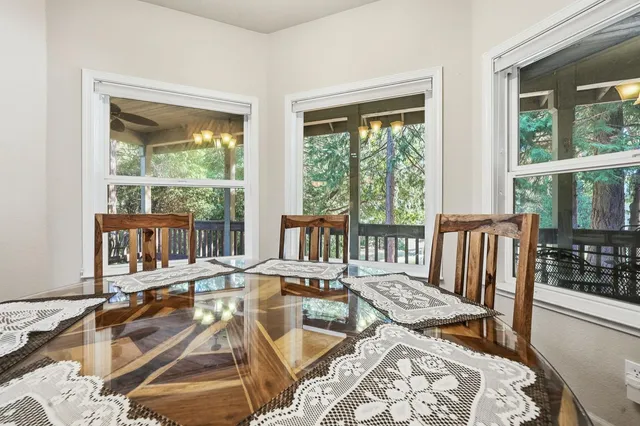 a kitchen that has a sink and a large window