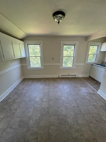 an empty room with windows