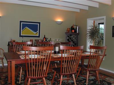 27 Holly Road Fairfax, CA 94930 - Photo 3 of 11 a view of a dining room with furniture and wooden floor