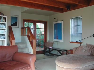 27 Holly Road Fairfax, CA 94930 - Photo 5 of 11 a living room with furniture and a potted plant