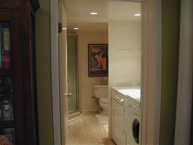 27 Holly Road Fairfax, CA 94930 - Photo 6 of 11 a bathroom with a granite countertop toilet and a shower
