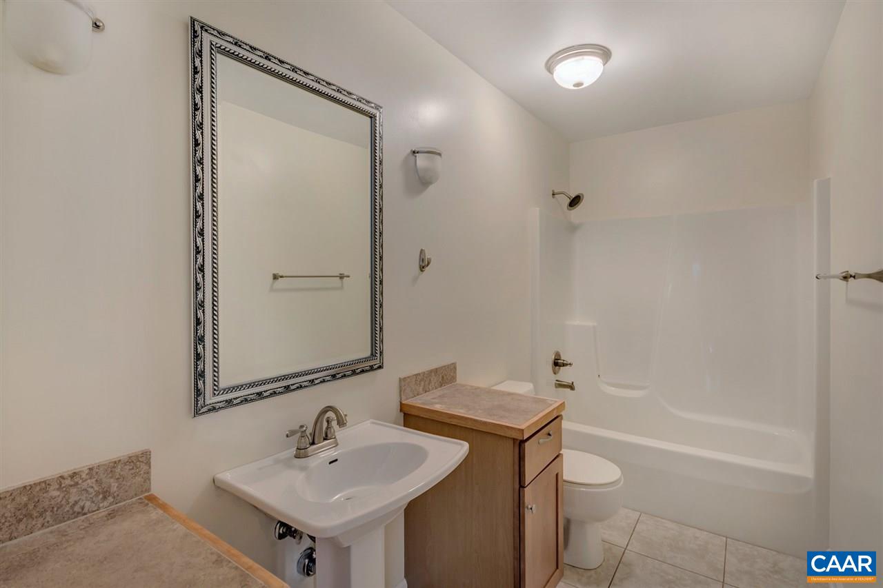 67 Amethyst Road Palmyra, VA 22963 - Photo 14 of 33 a bathroom with a sink toilet and shower