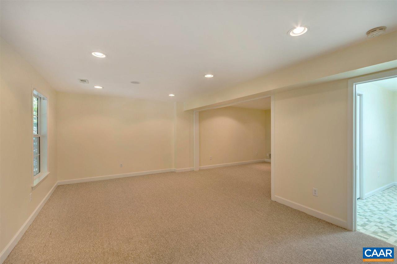 67 Amethyst Road Palmyra, VA 22963 - Photo 17 of 33 an empty room with a empty space and windows