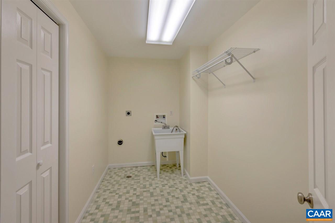 67 Amethyst Road Palmyra, VA 22963 - Photo 21 of 33 a bathroom with a sink and a mirror