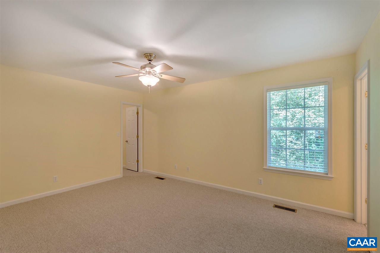 67 Amethyst Road Palmyra, VA 22963 - Photo 8 of 33 an empty room with windows and ceiling fan