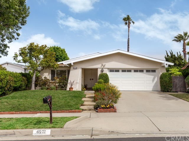 4912 Delacroix Road Rancho Palos Verdes, CA 90275 - Photo 1 of 1 a front view of a house with garden