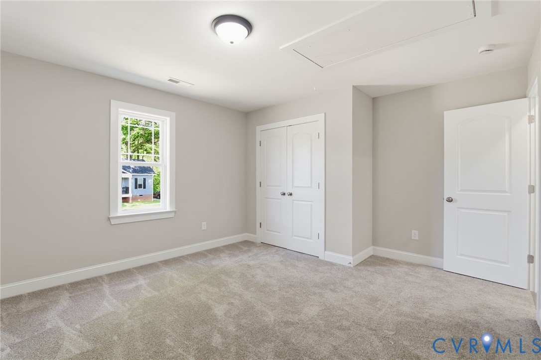 17557 Hewlett Road Beaverdam, VA 23015 - Photo 18 of 29 a view of an empty room with a window