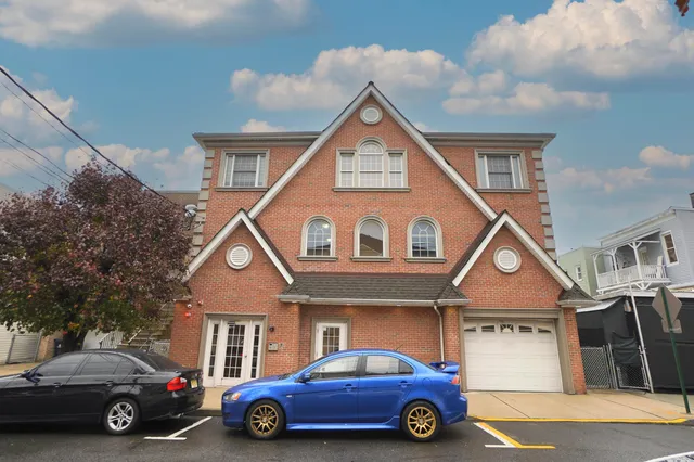 a car parked in front of a house