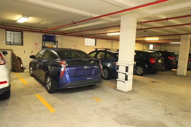 a front view of a house with parking