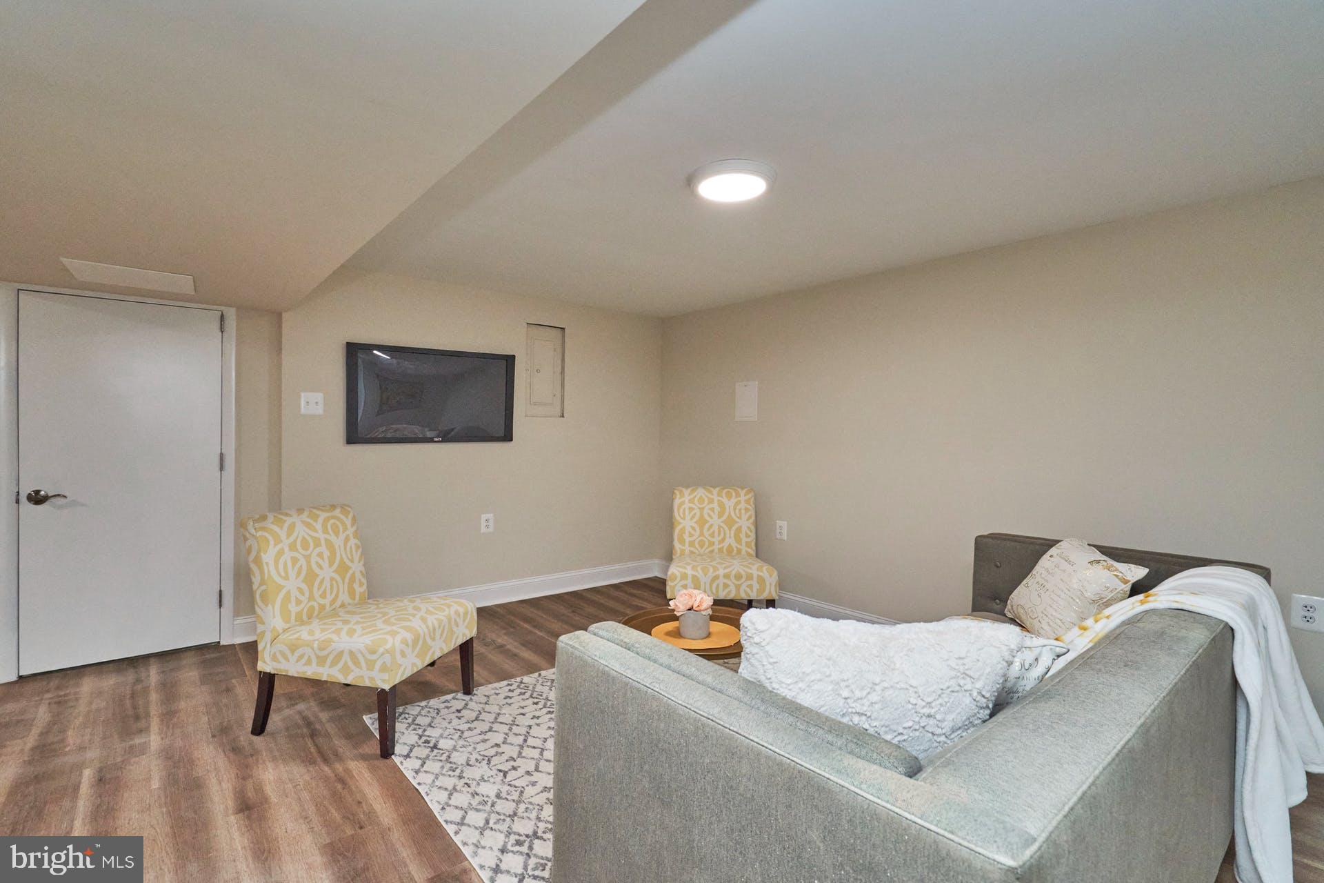 7422 Fordson Road Alexandria, VA 22306 - Photo 23 of 34 Rec Room with new light fixtures