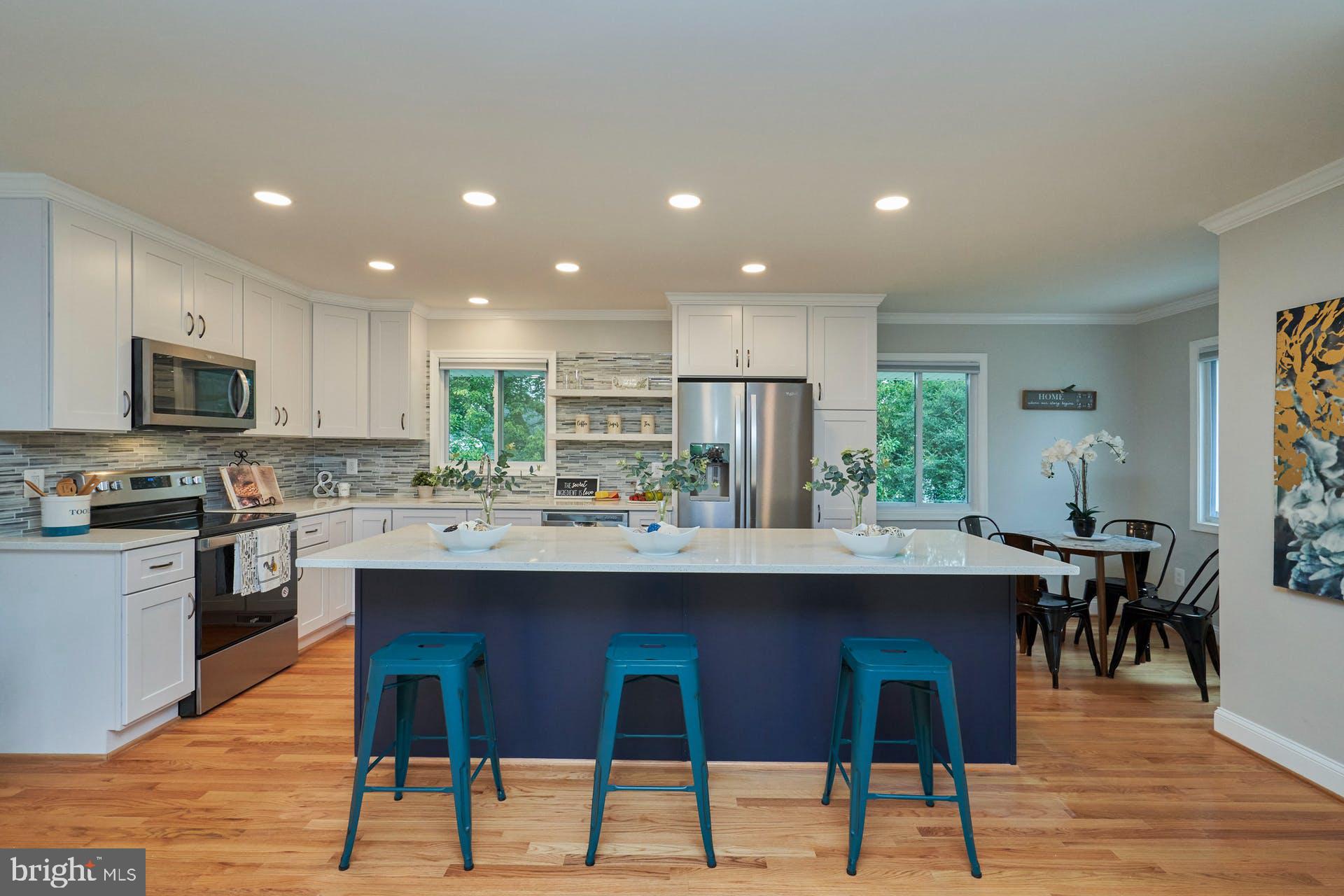 7422 Fordson Road Alexandria, VA 22306 - Photo 9 of 34 Center island with granite countertops