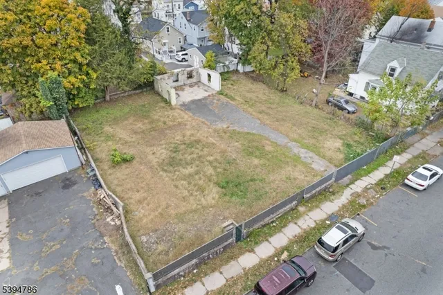 an aerial view of residential house with outdoor space