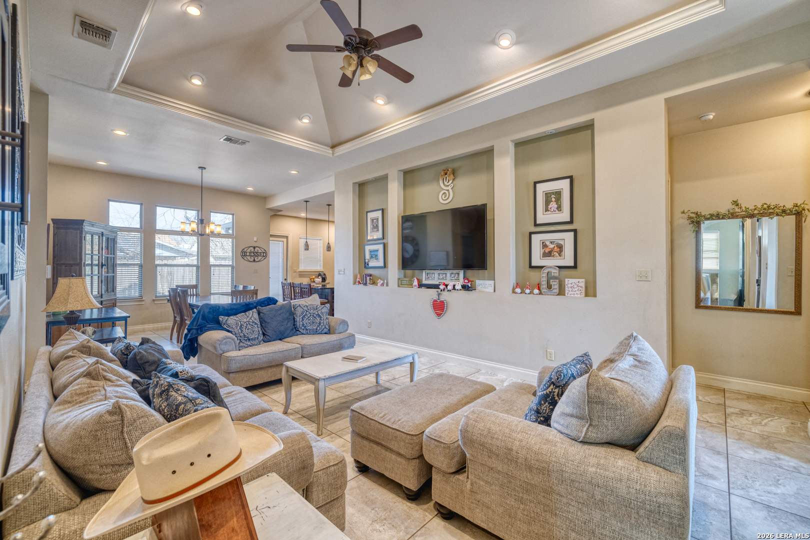137 Sutton Place Uvalde, TX 78801 - Photo 12 of 31 a living room with furniture and a flat screen tv