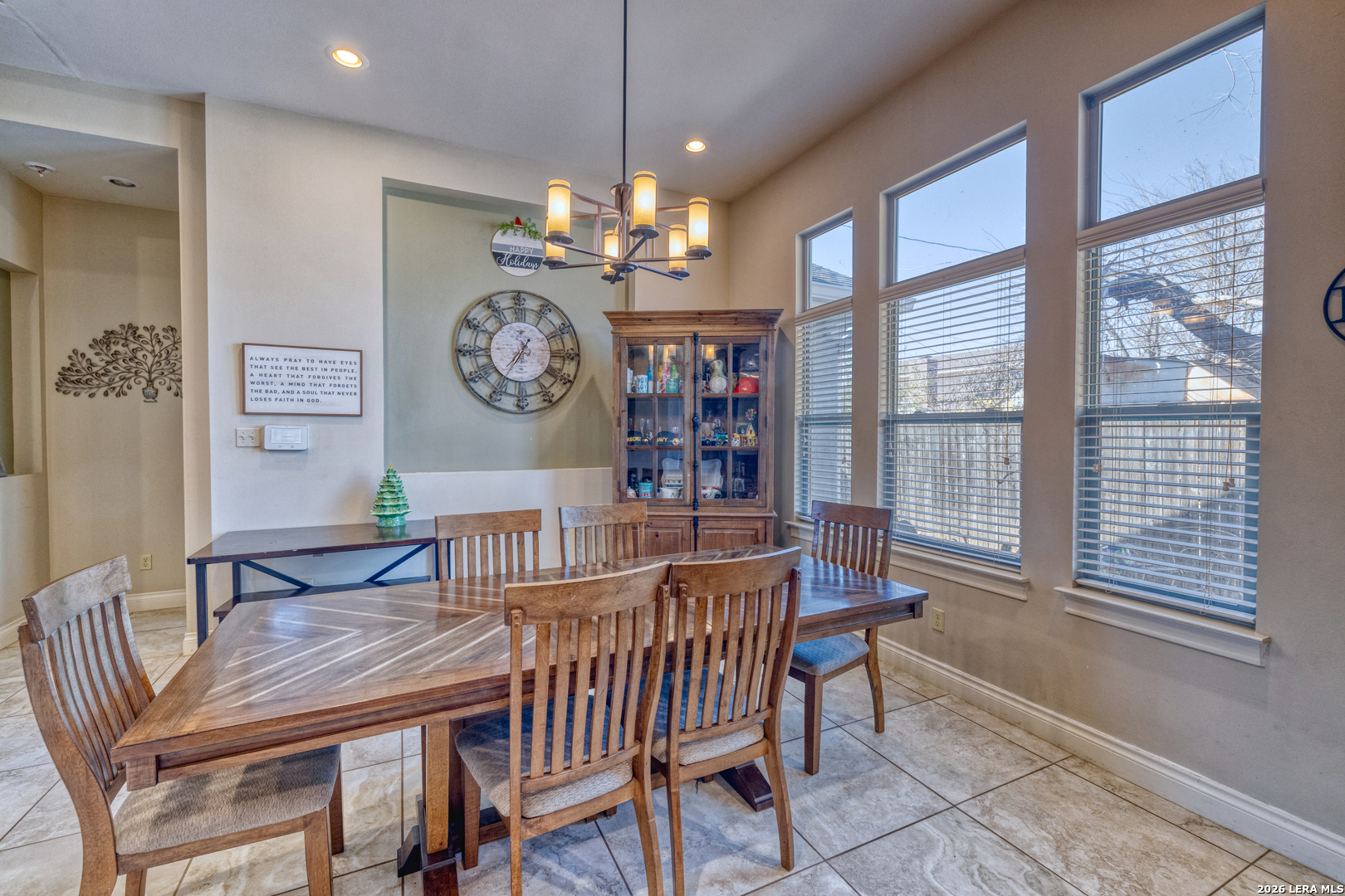 137 Sutton Place Uvalde, TX 78801 - Photo 15 of 31 a view of a dining room with furniture window and wooden floor