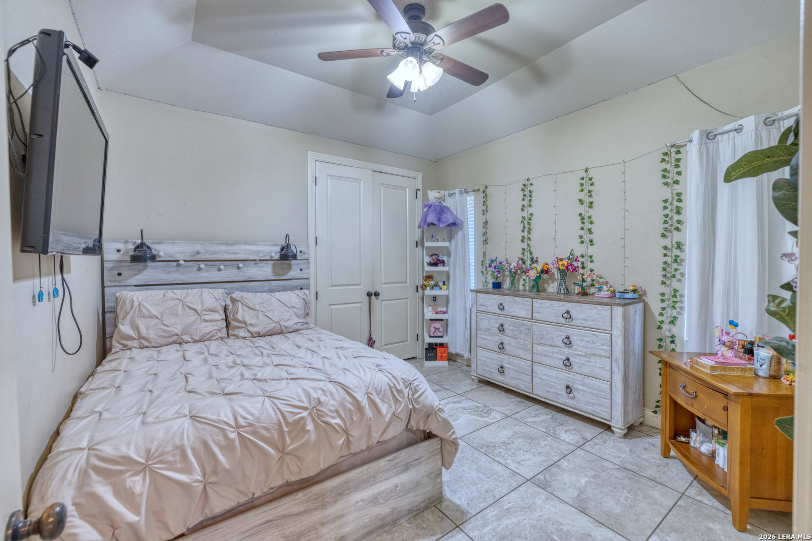 137 Sutton Place Uvalde, TX 78801 - Photo 24 of 31 a bedroom with a bed and a dresser in it