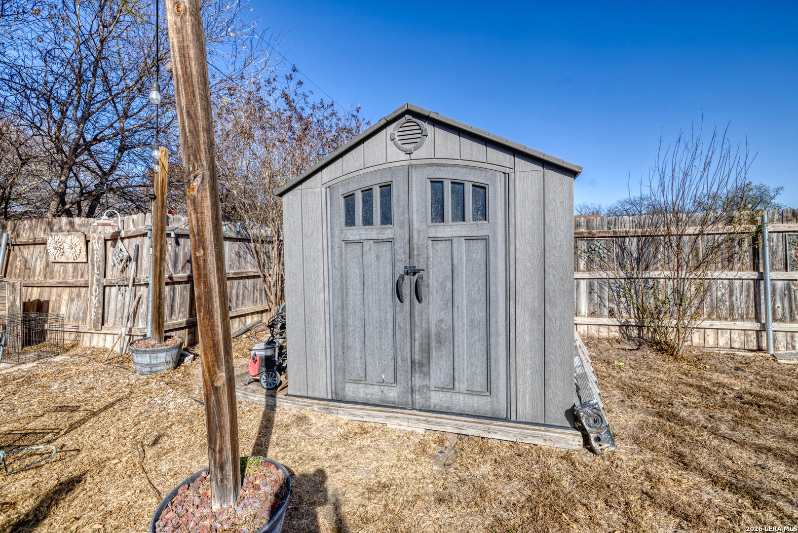 137 Sutton Place Uvalde, TX 78801 - Photo 7 of 31 a view of a wooden fence