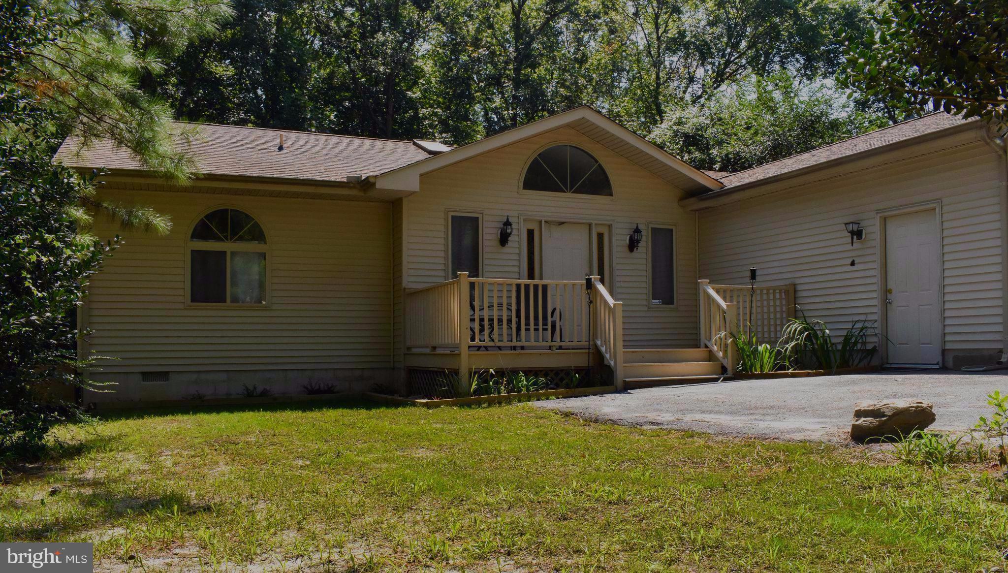 15 Sandyhook Road Ocean Pines, MD 21811 - Photo 2 of 29 a front view of a house with a yard