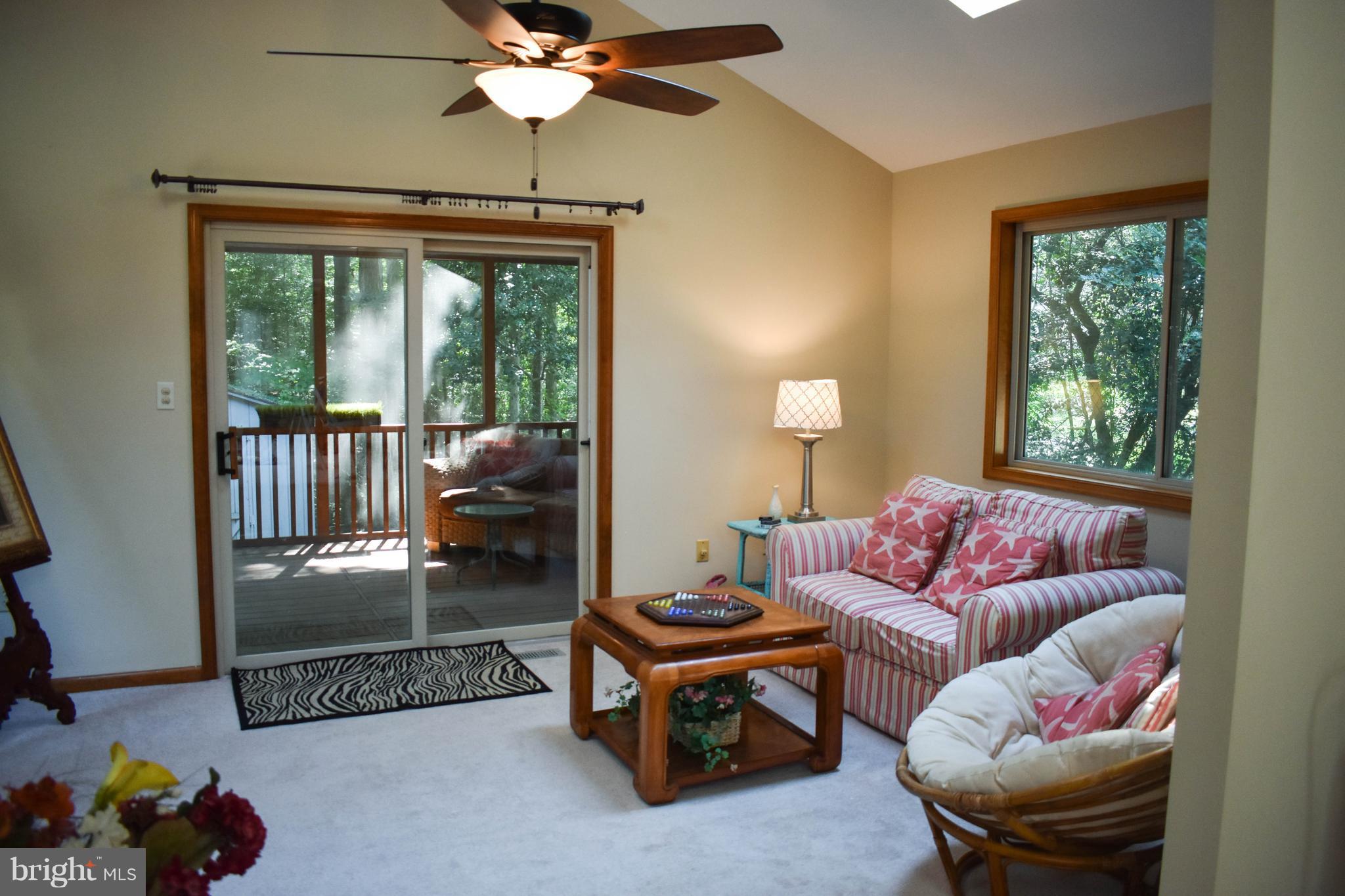 15 Sandyhook Road Ocean Pines, MD 21811 - Photo 13 of 29 a living room with furniture and a window
