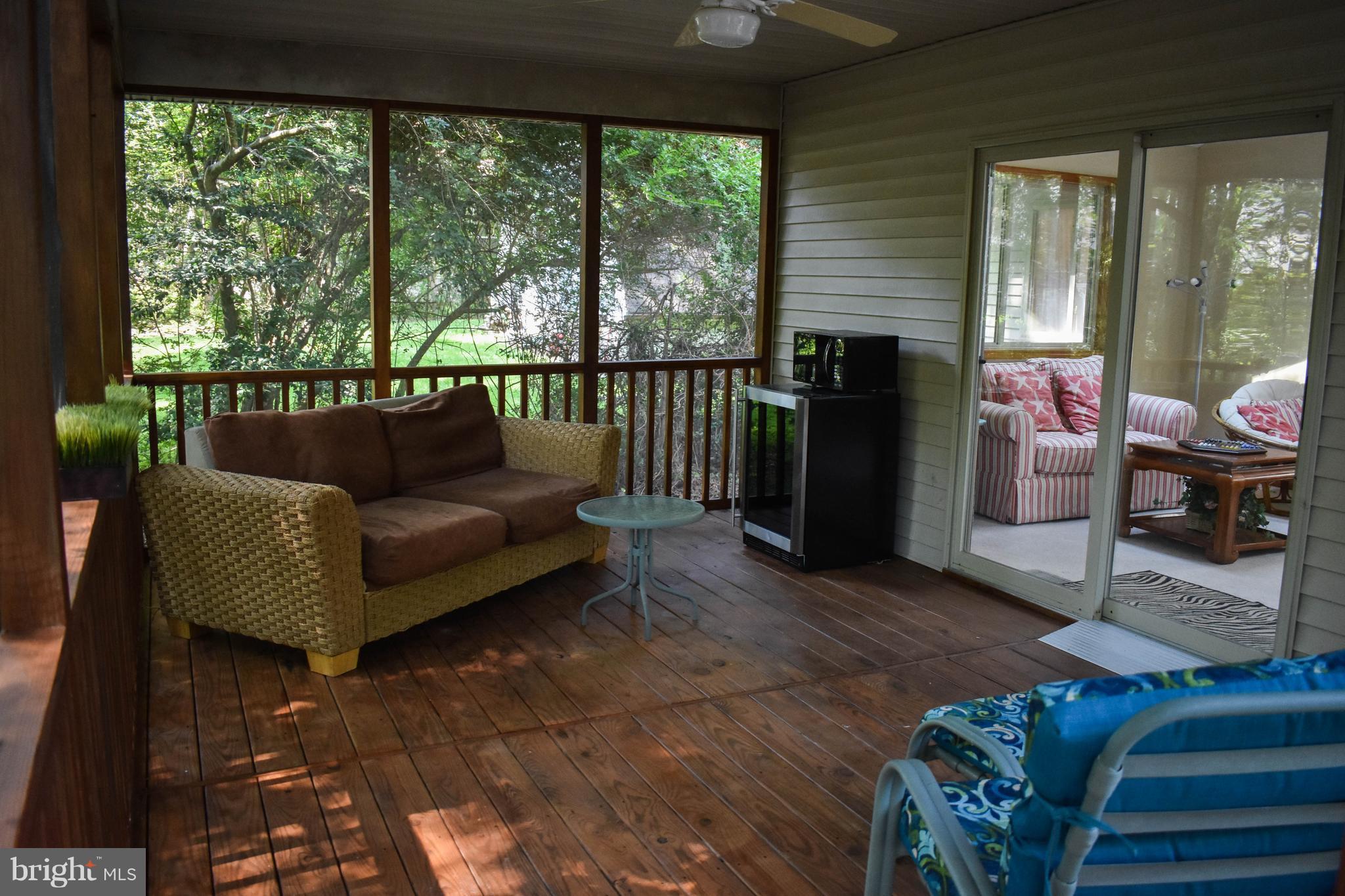 15 Sandyhook Road Ocean Pines, MD 21811 - Photo 14 of 29 a living room with furniture and a large window
