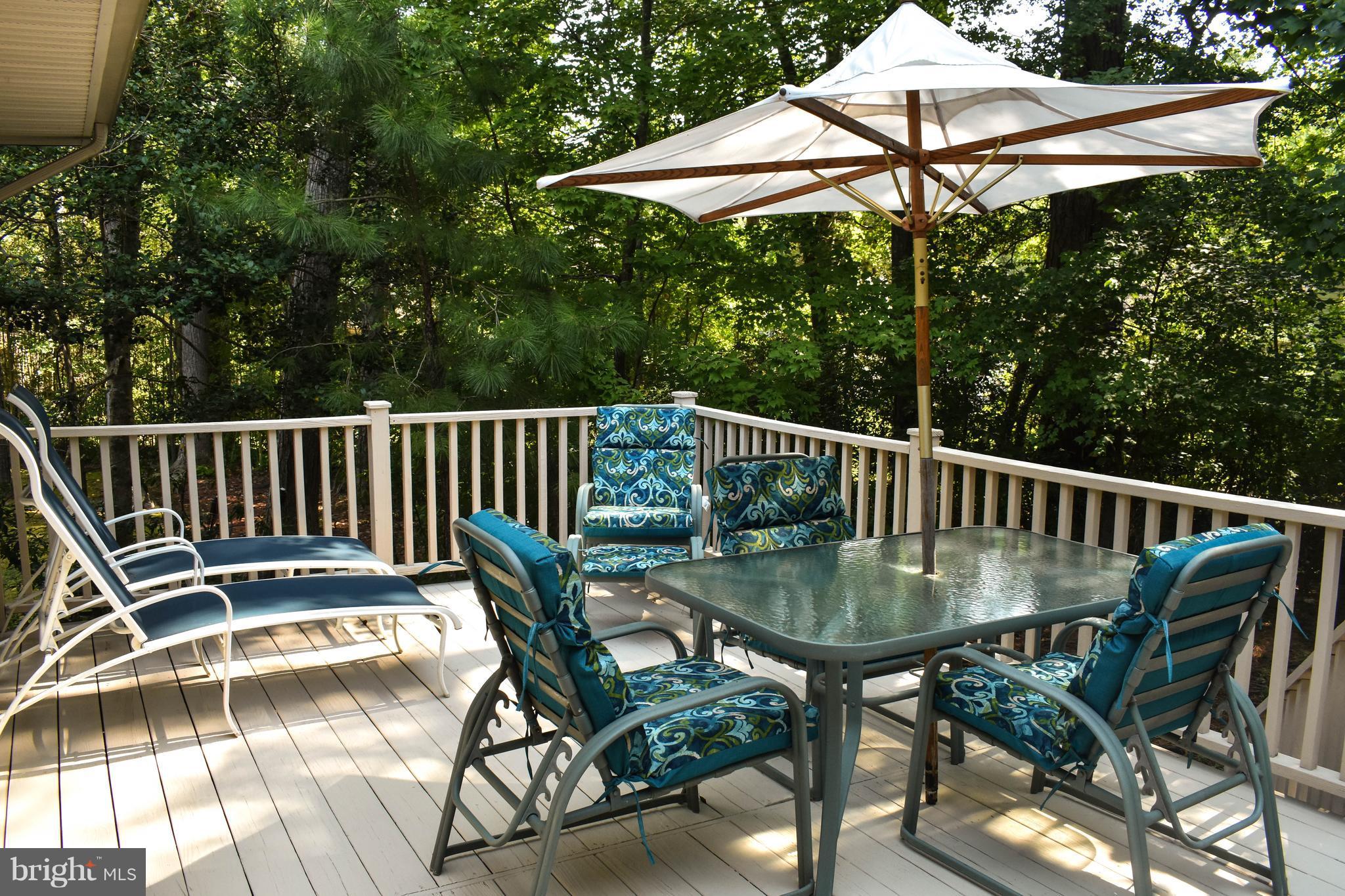 15 Sandyhook Road Ocean Pines, MD 21811 - Photo 18 of 29 a view of balcony with outdoor seating and wooden floor