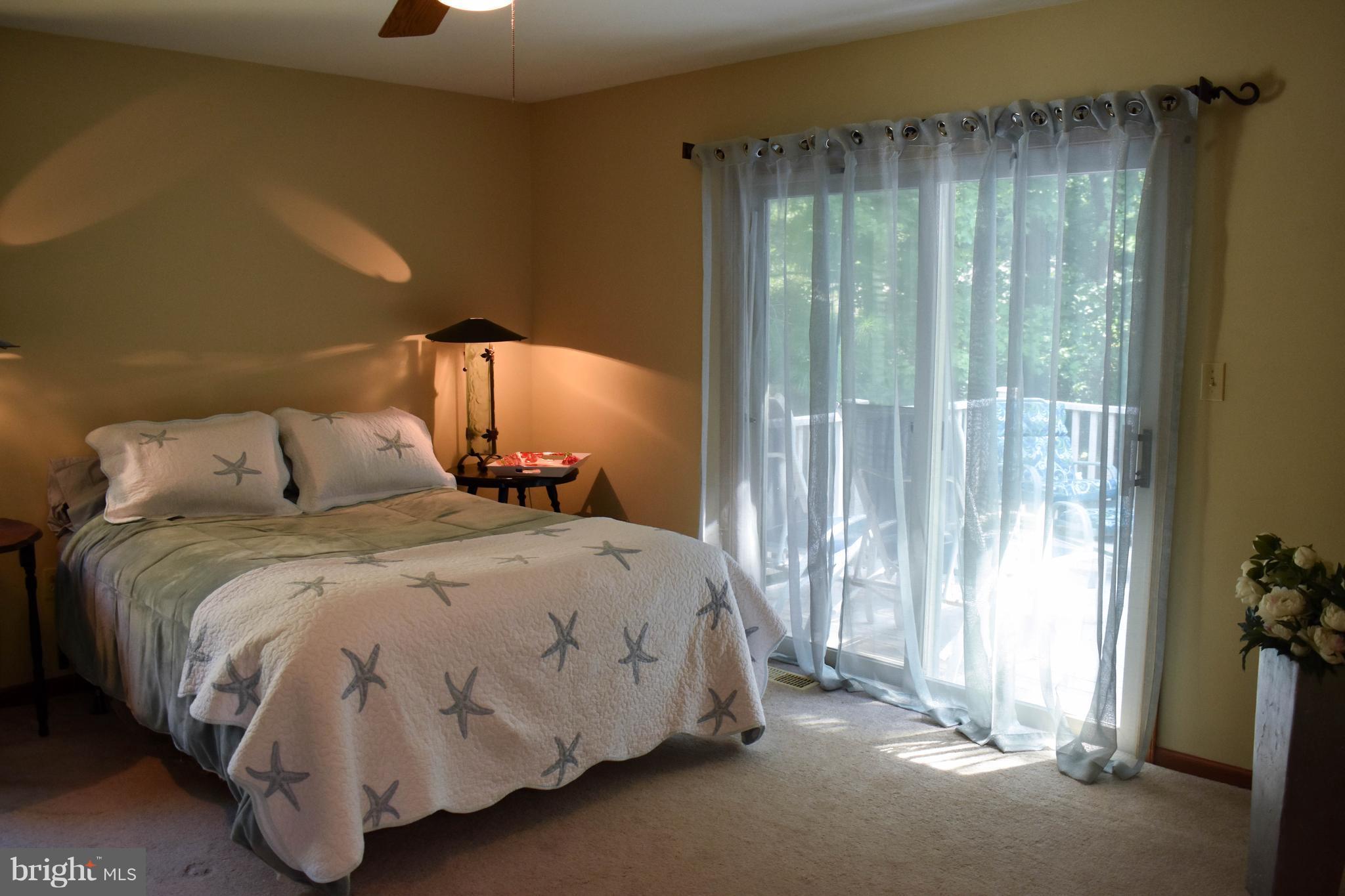 15 Sandyhook Road Ocean Pines, MD 21811 - Photo 20 of 29 a bedroom with a bed and a window