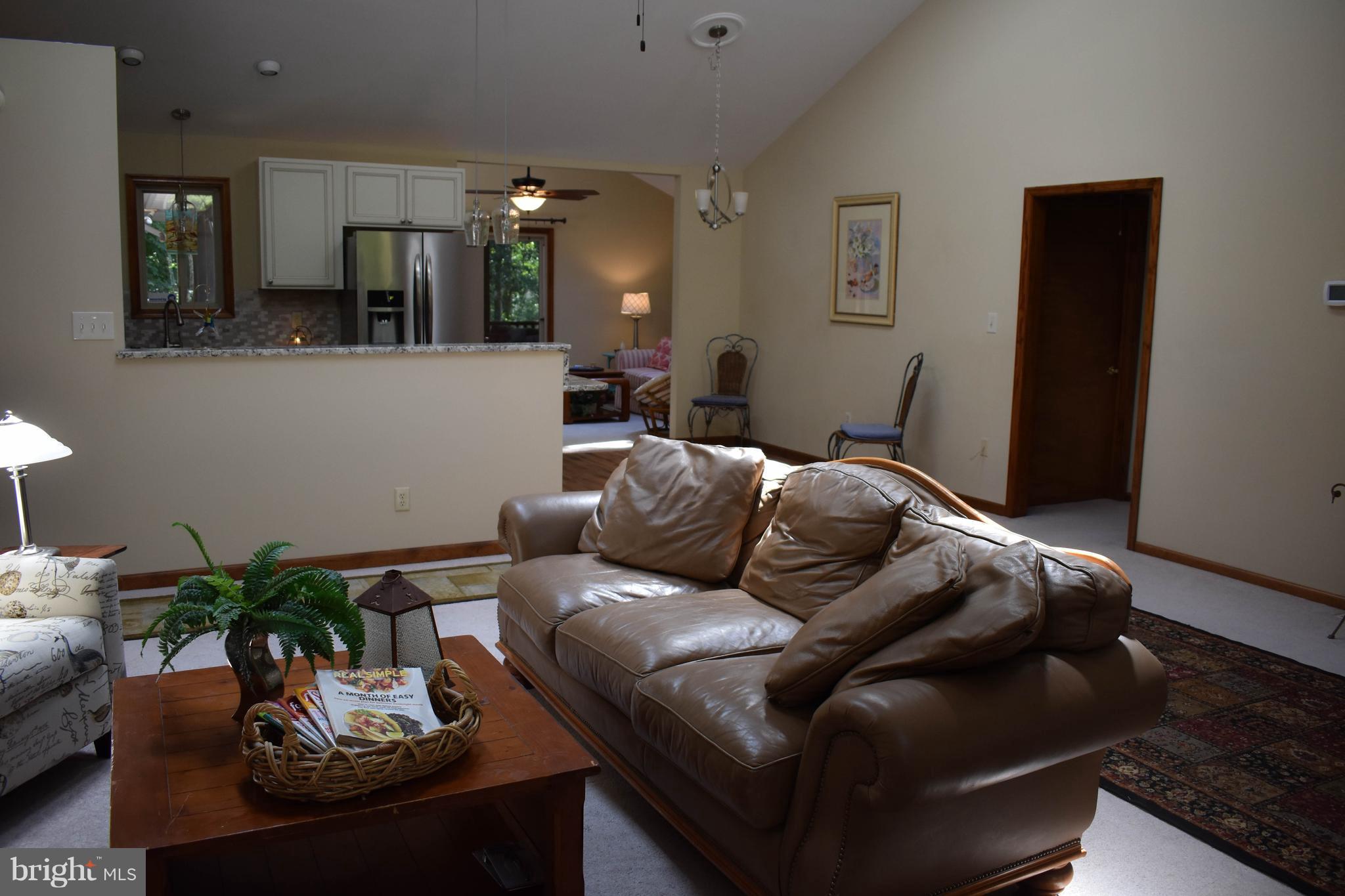 15 Sandyhook Road Ocean Pines, MD 21811 - Photo 6 of 29 a living room with furniture and wooden floor