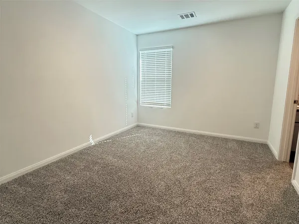 an empty room with a workbench