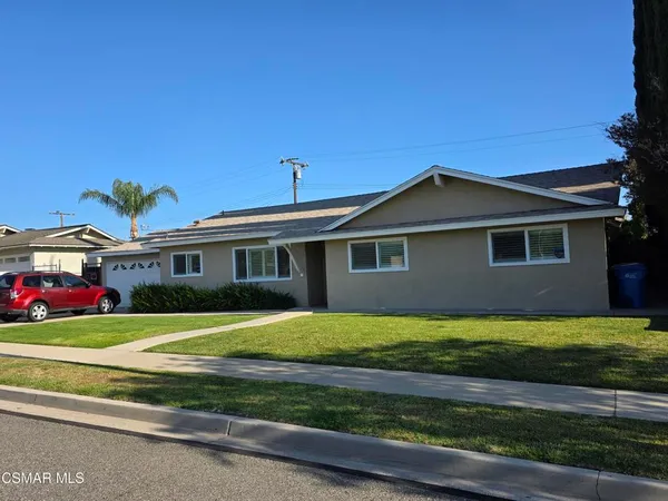 a view of a house with a big yard