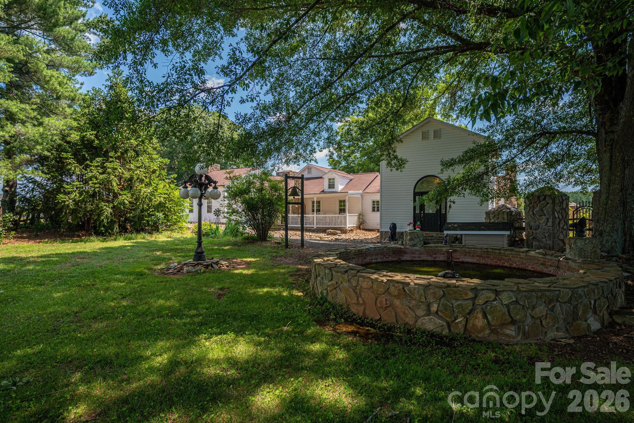 1387 George Brown Road Crouse, NC 28033 - Photo 2 of 48 a view of a house with backyard and sitting area