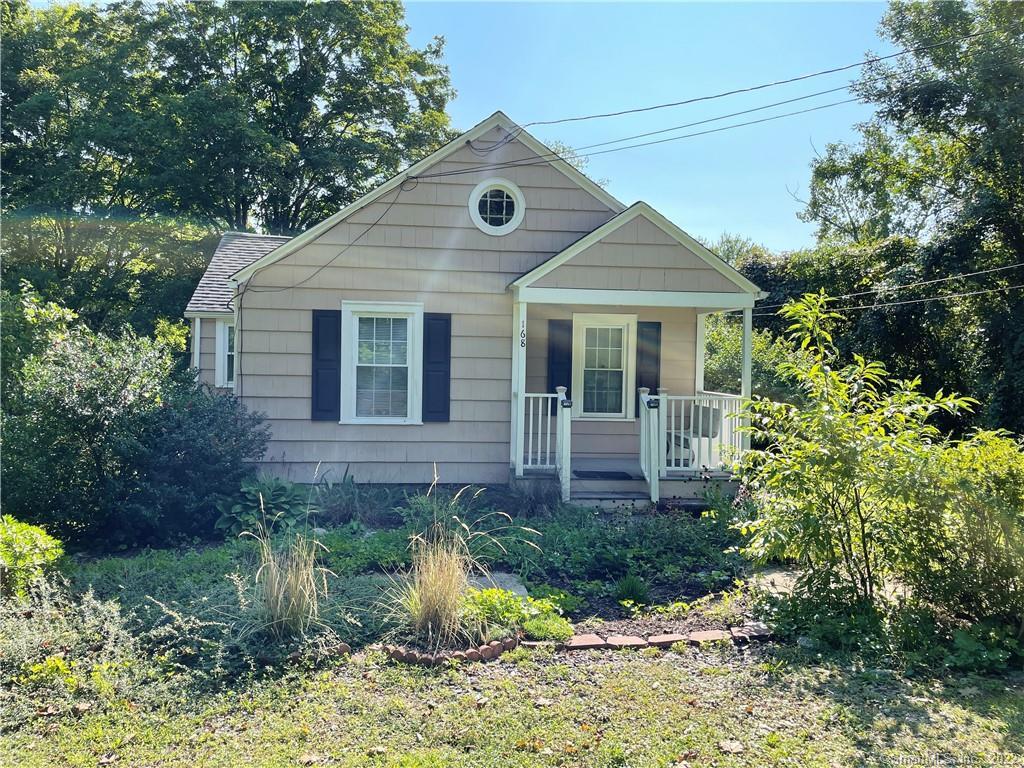 168 Summit Road Prospect, CT 06712 - Photo 1 of 1 a front view of a house with garden