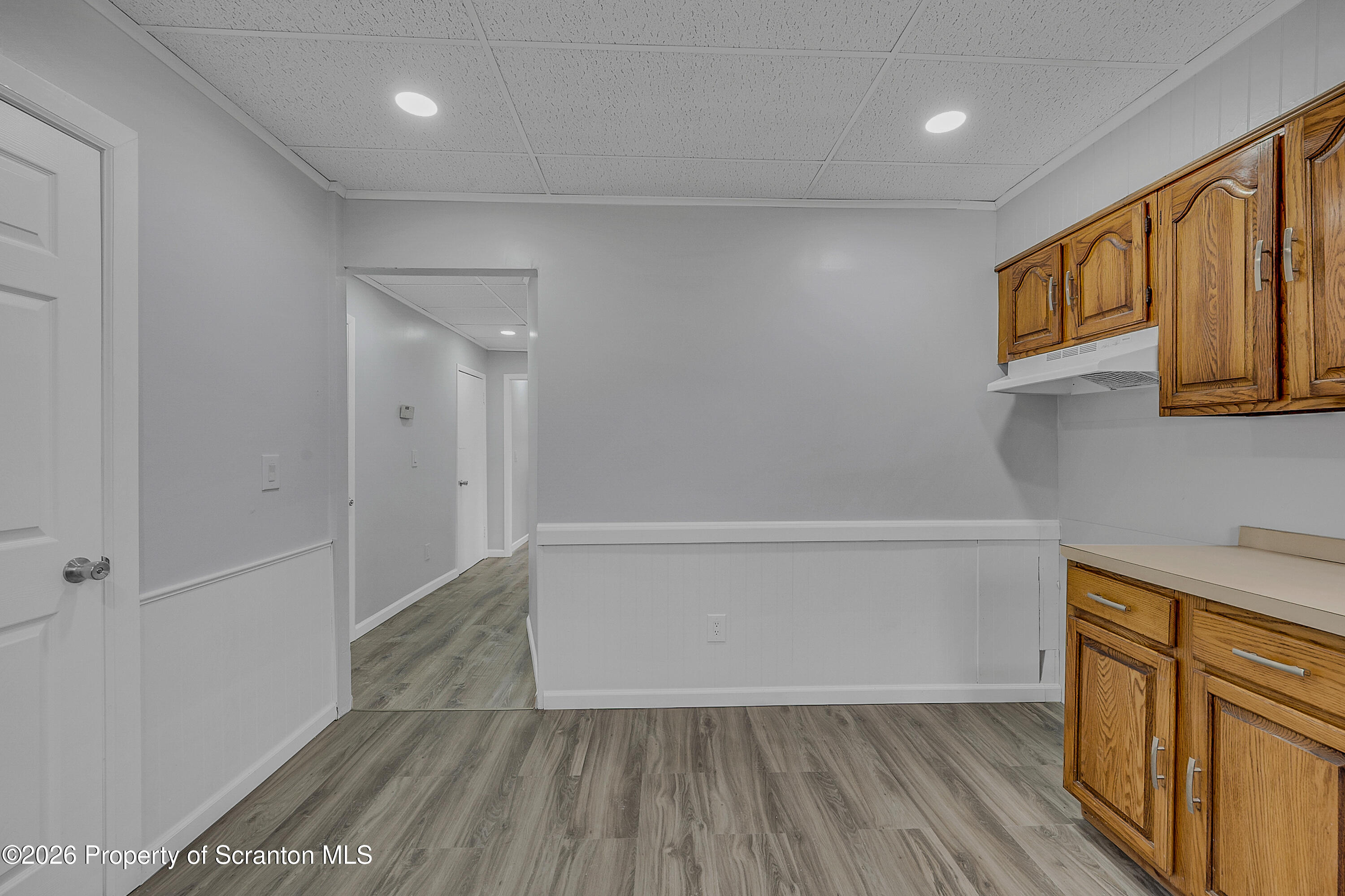 8 Green Ridge Street, Unit 1 Scranton, PA 18509 - Photo 13 of 15 a view of empty room with wooden floor and fan