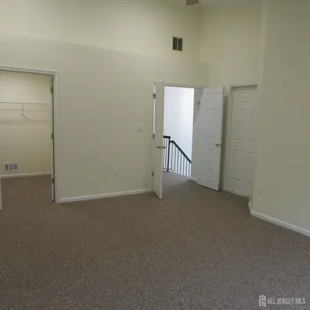 a view of a room with stairs