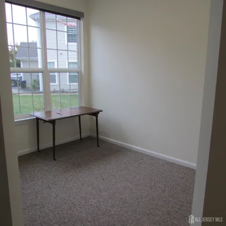 an empty room with window