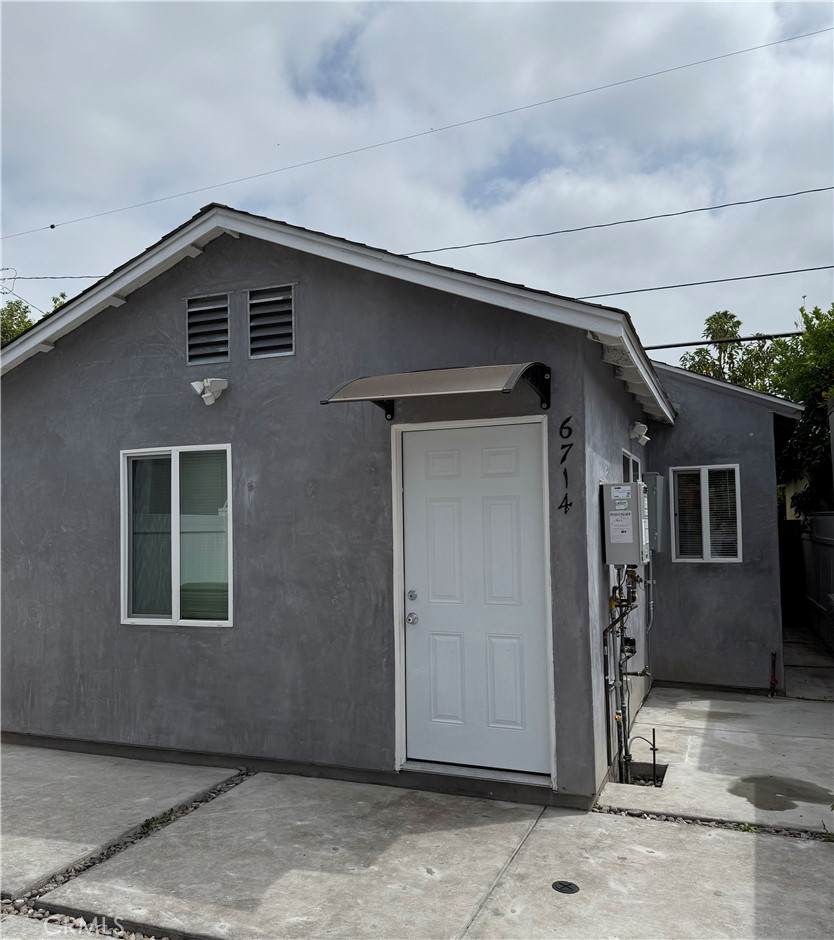 6714 Etiwanda Avenue Reseda, CA 91335 - Photo 1 of 7 a front view of a house