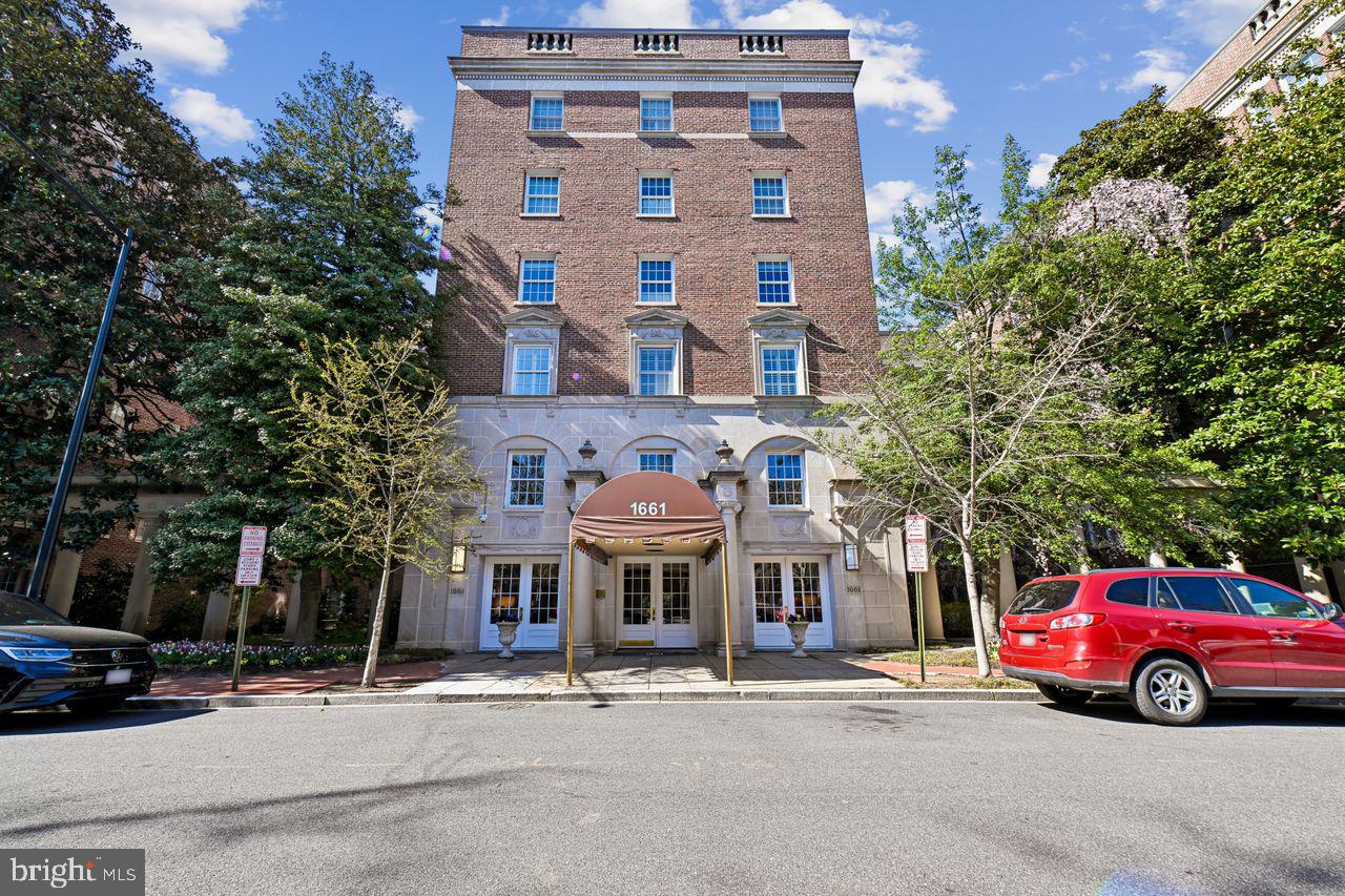 1661 Crescent Place Northwest, Unit 502 Washington, DC 20009 - Photo 11 of 50 a front view of a building with trees