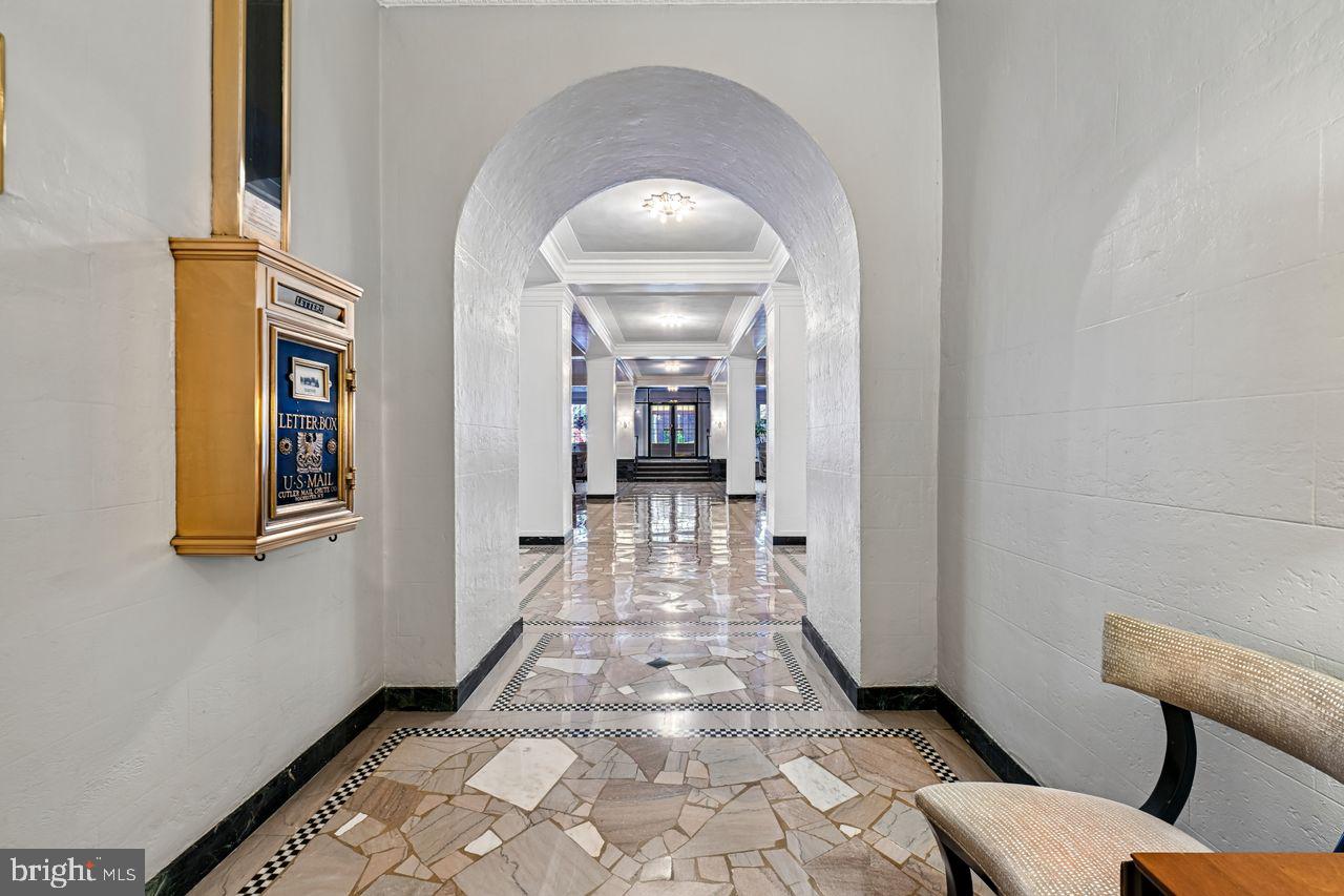 1661 Crescent Place Northwest, Unit 502 Washington, DC 20009 - Photo 17 of 50 a view of a hallway with furniture and stairs